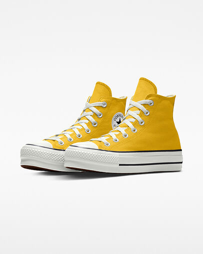 bright yellow converse shoes