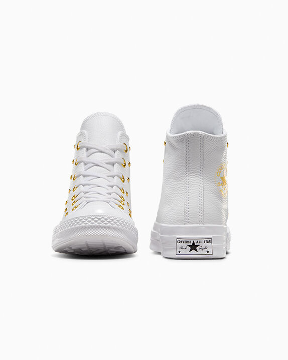white converse with gold studs
