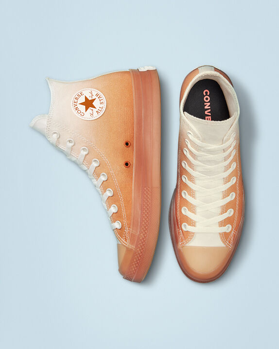 black converse with orange bottom