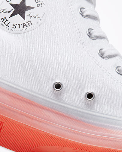 white converse with orange bottom