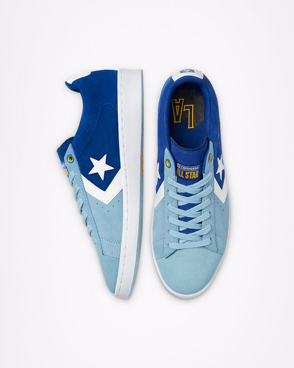 blue converse with heart