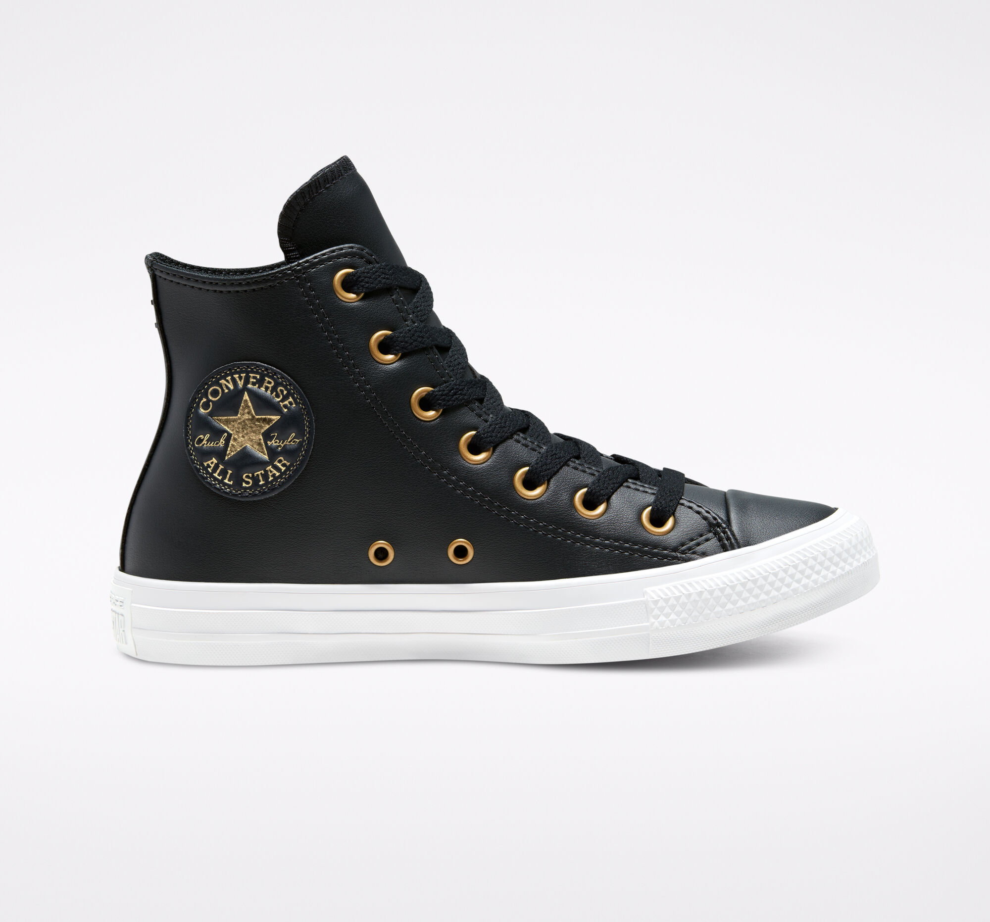 black and gold chucks