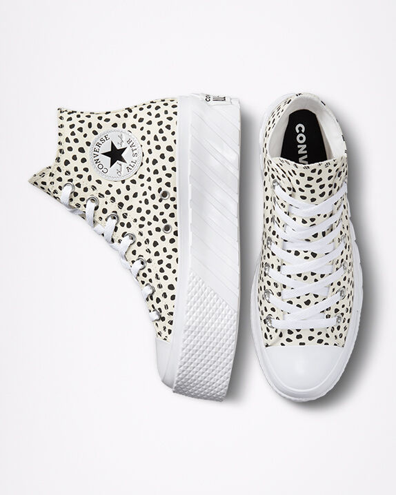 black and white patterned converse