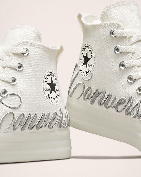 embroidered white converse