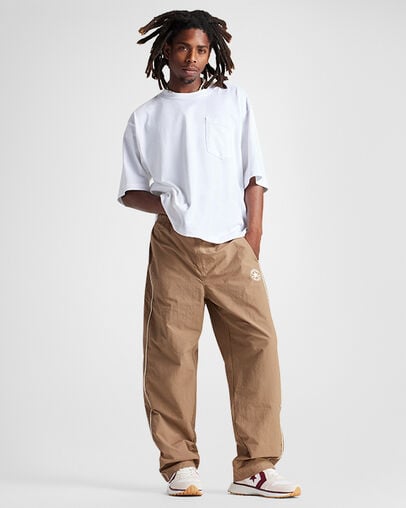 Omni Trainer Egret/Vintage White/Park Red, On Foot Shot 1