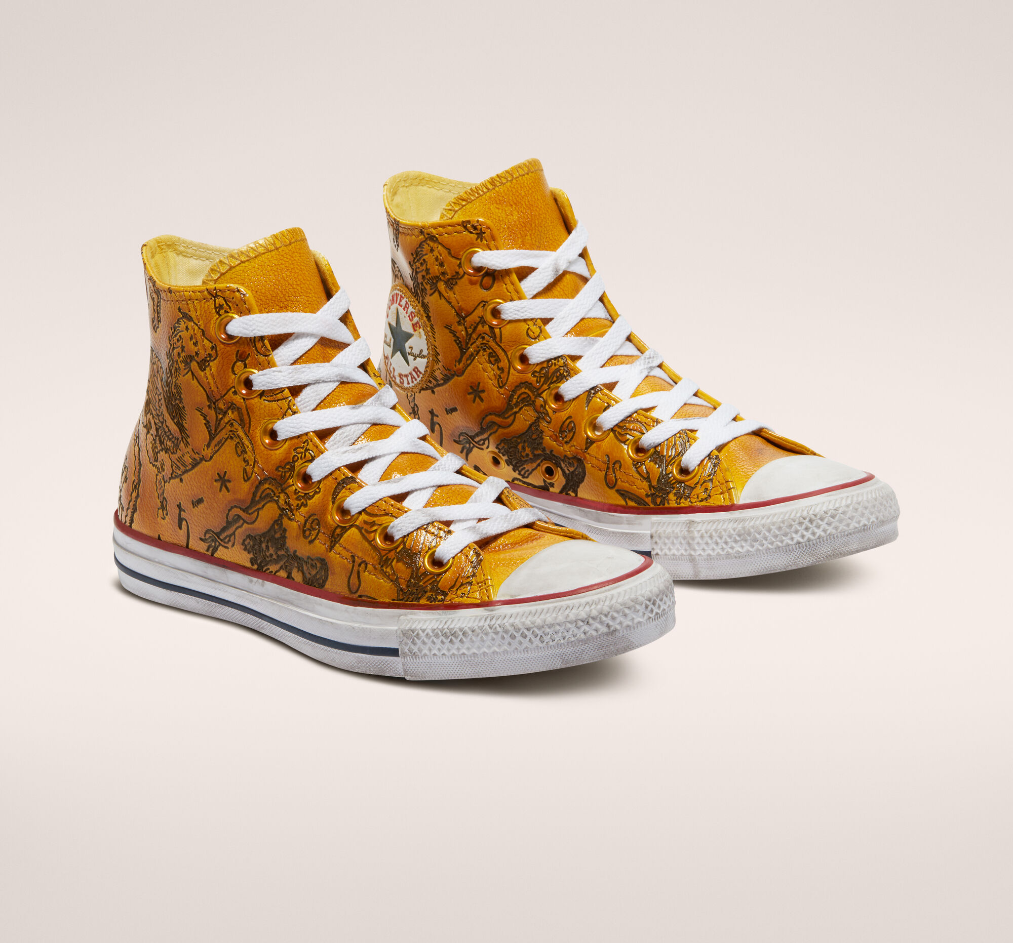 Chuck Taylor All Star Zodiac Leather Unisex HighTop Shoe.