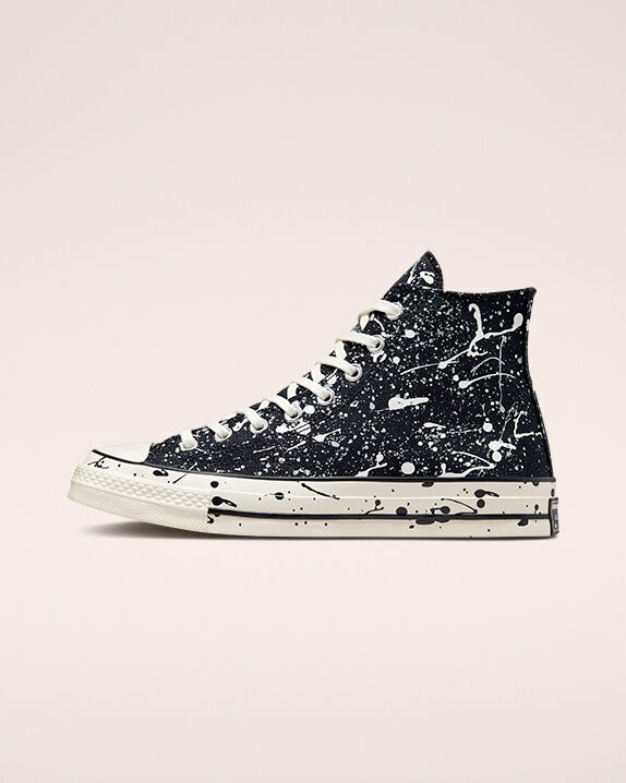 white converse with paint splatter