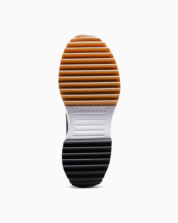 black converse with orange bottom