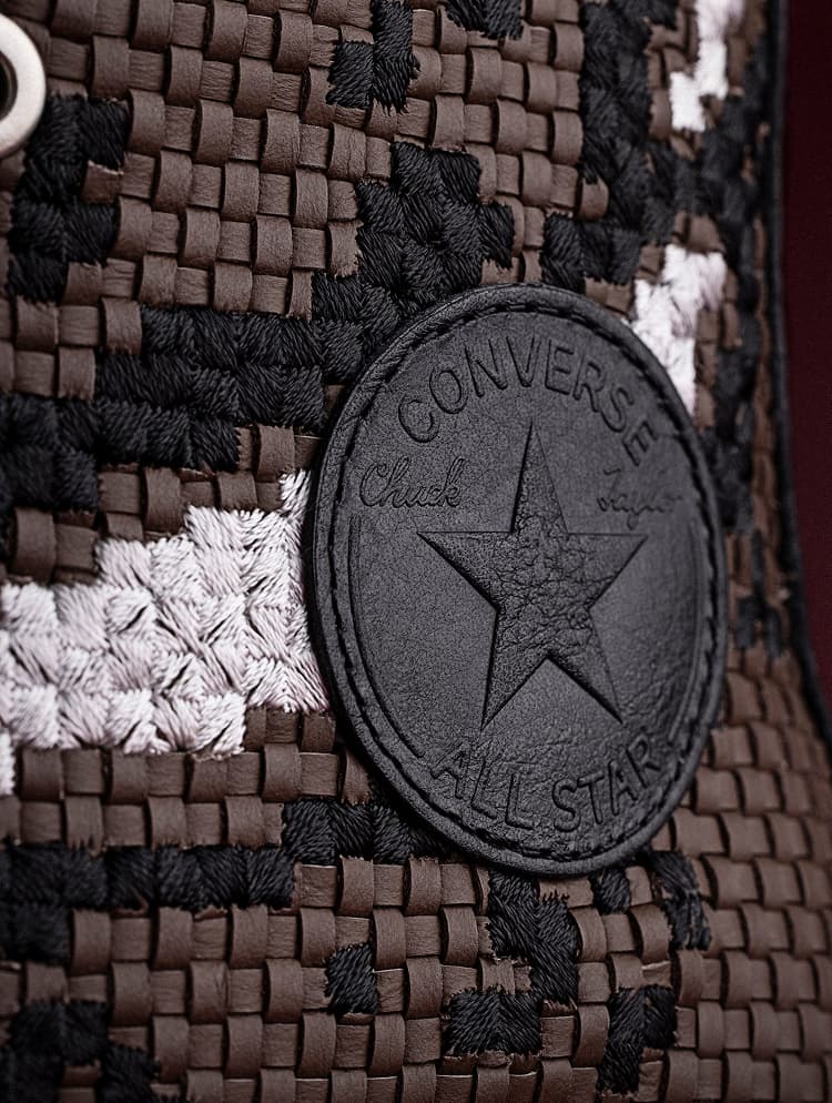 The image shows close-up views of various Converse sneakers, including a white high-top with brown stitching on the heel and a pair featuring a black-and-white floral pattern. The details highlight the textured soles, metal eyelets, laces, and embossed Converse star logos on the shoes.