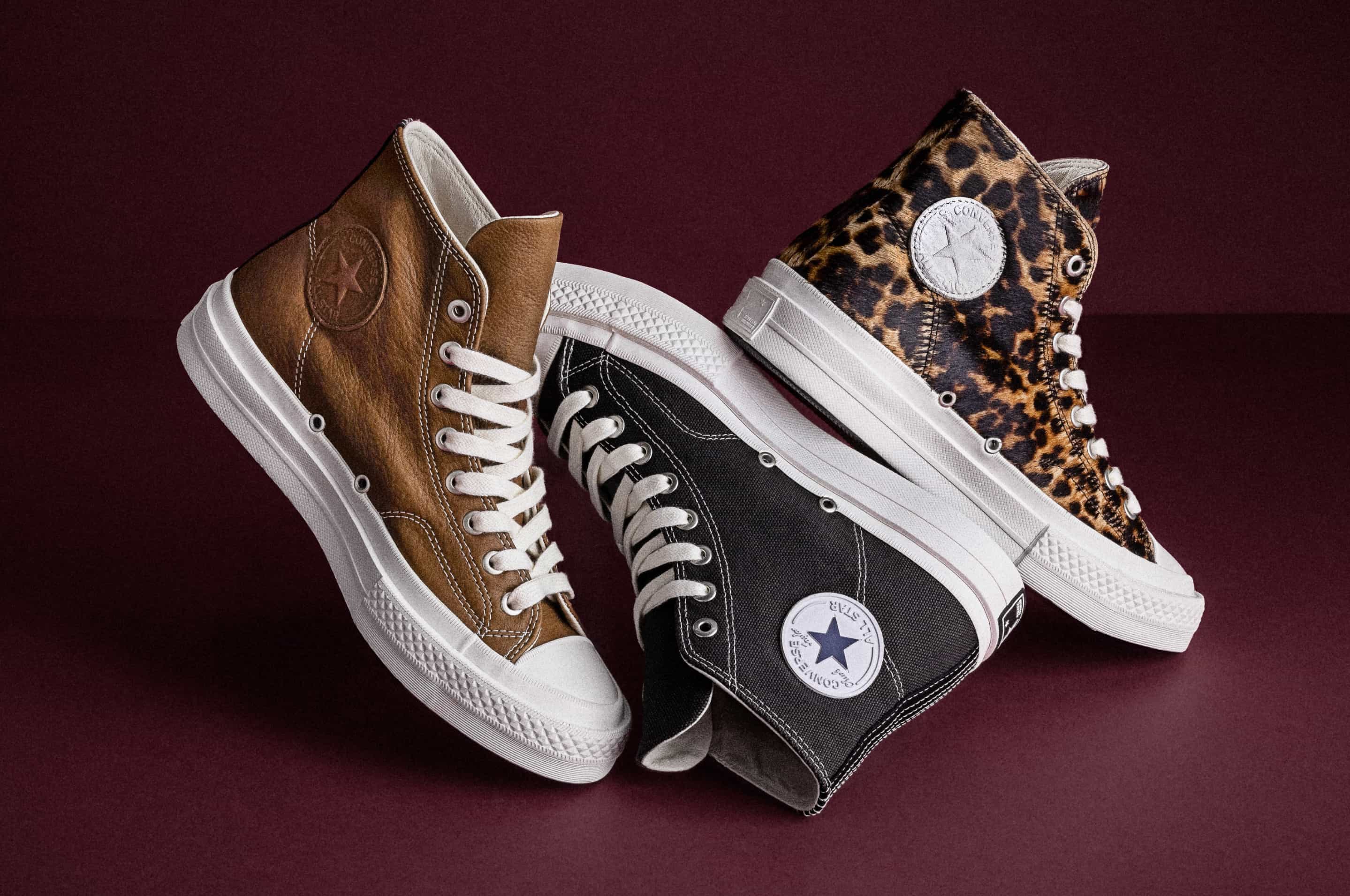 The image shows close-up views of white Converse sneakers, highlighting different styles and details like stitching, laces, and logos. The left side features a high-top with brown accents, while the right side focuses on low-top shoes with textured rubber soles.