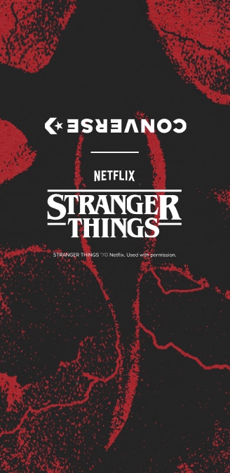 A high-contrast poster with a red-and-black textured background features the white “STRANGER THINGS” logo centered and the word “NETFLIX” above it. The upside-down “CONVERSE” logo appears near the top, creating a mirrored, eerie composition.