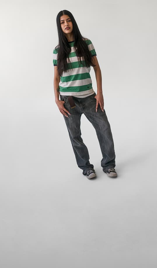Woman in Classic Chuck Shoes