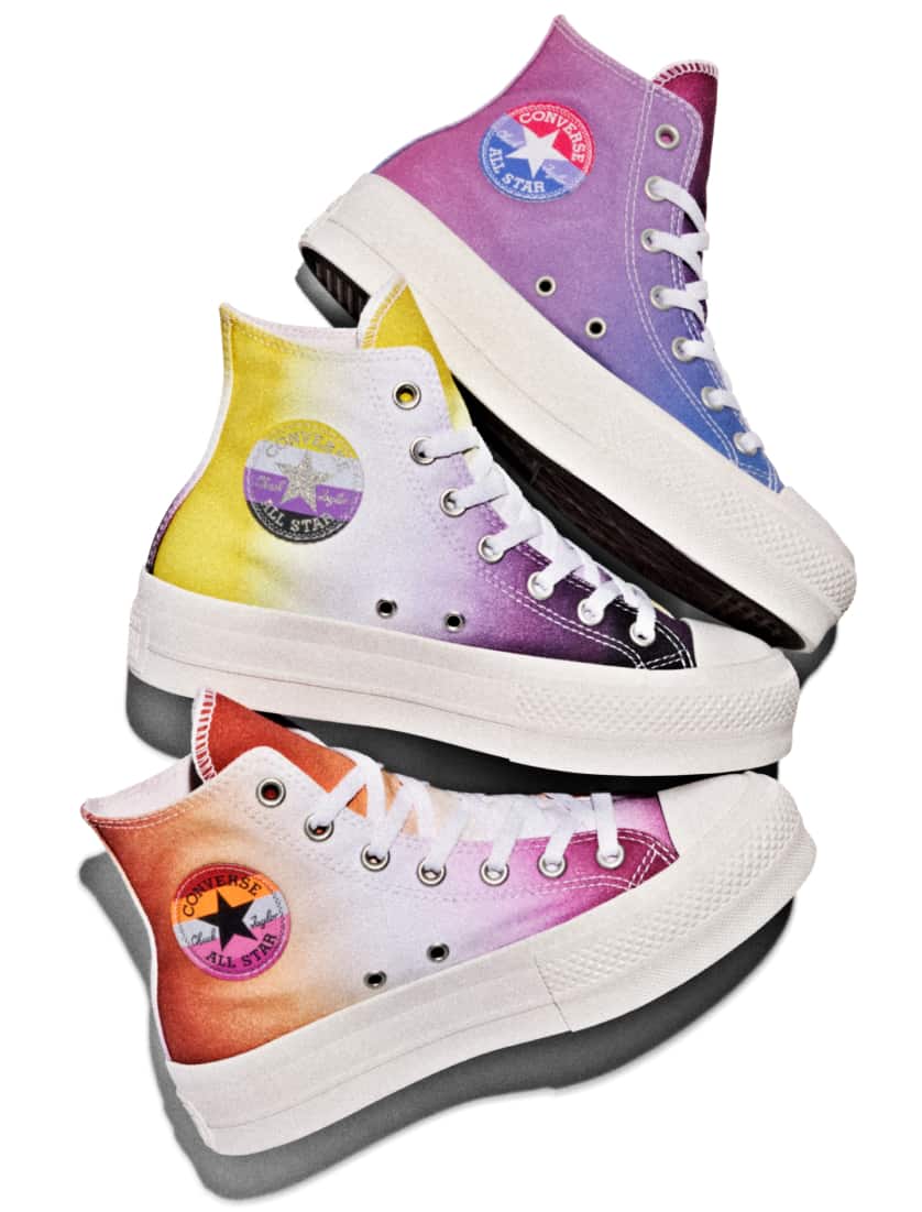 Three custom pride shoes
