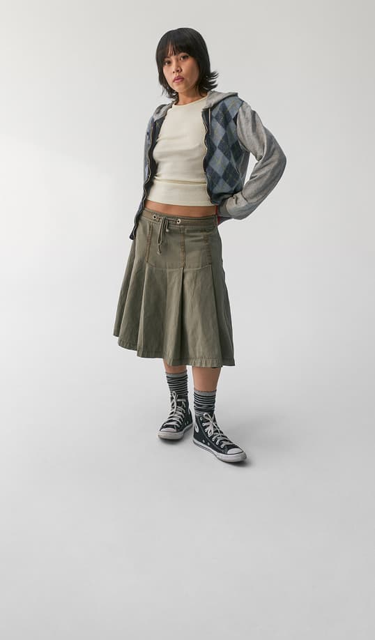 Woman in Classic Chuck Shoes