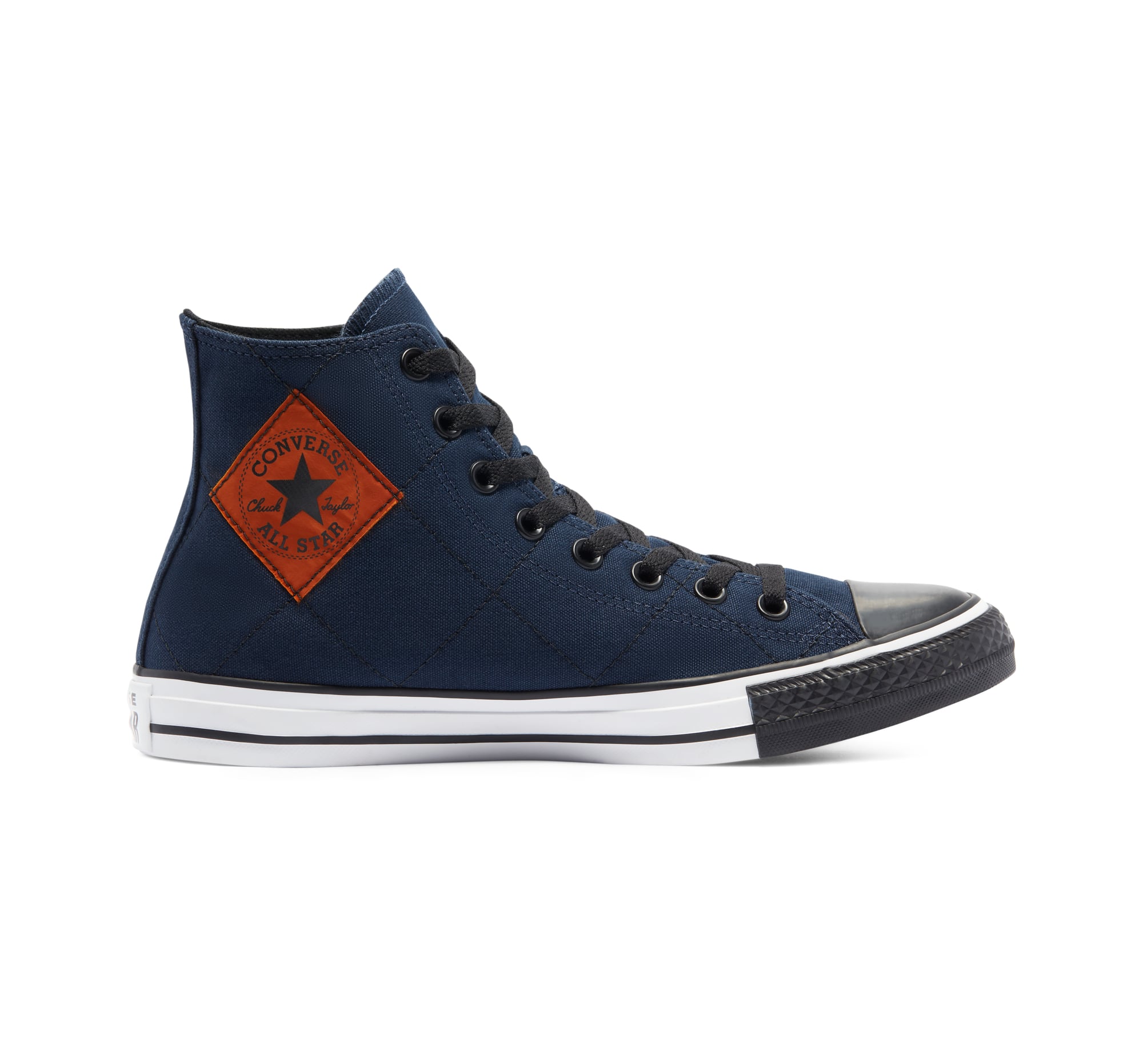 raiders chuck taylors